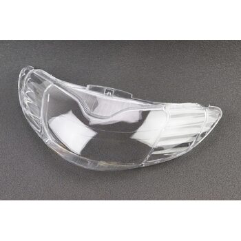 Стекло фары передней